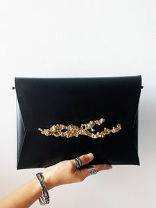 studio metallurgy coral clutch  leather