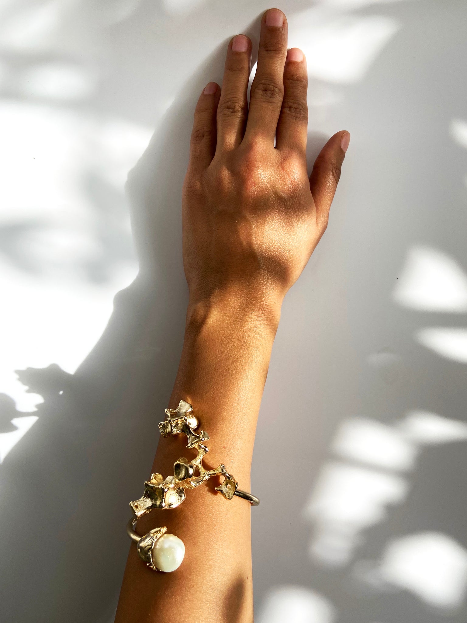 The Sculpted Brass & Pearl Bangle Cuff