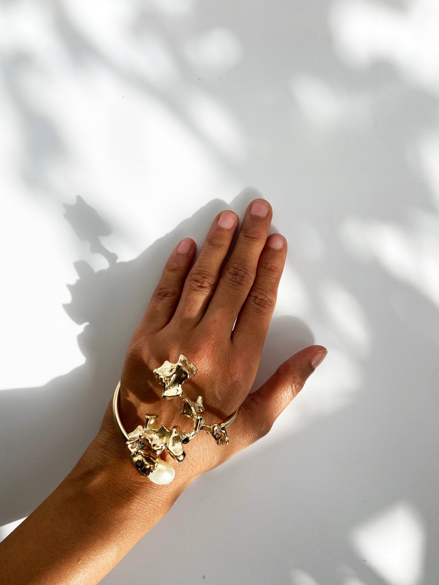 The Sculpted Brass & Pearl Bangle Cuff
